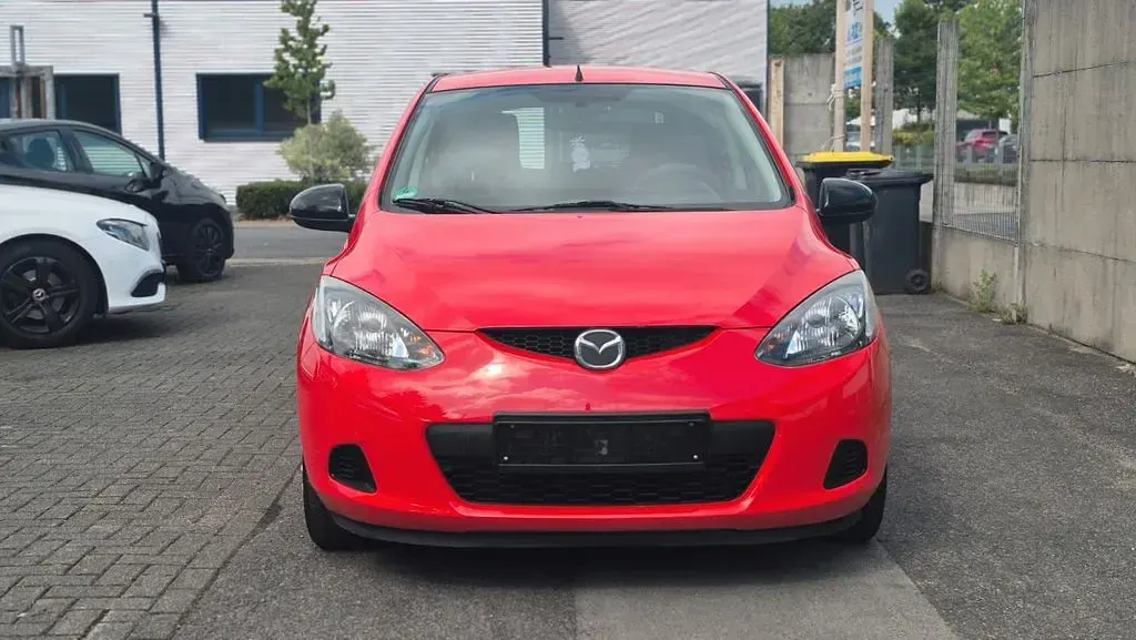Gebraucht Mazda 2 Independence 75 PS (55 kW) 2009 Rot Kleinwagen