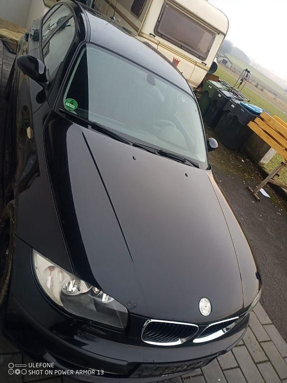 Gebraucht BMW 116 122 PS (89 kW) 2009 Schwarz Kleinwagen