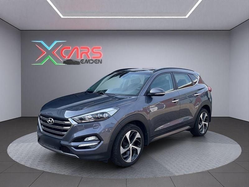 Grau Gebraucht 2016 Hyundai Tucson Premium SUV | 16.999 € (Fairer Preis) - Bild 1/4
