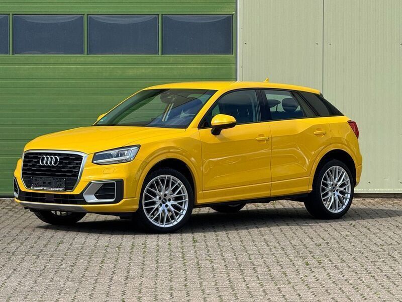 Gelb Gebraucht 2017 Audi Q2 Design SUV | 16.895 € (Fairer Preis) - Bild 1/4