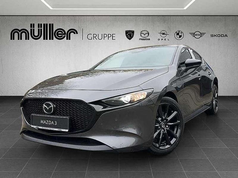 Machine gray Gebraucht 2025 Mazda 3 Homura-Line Limousine | 26.907 € (Etwas zu teuer) - Bild 1/4