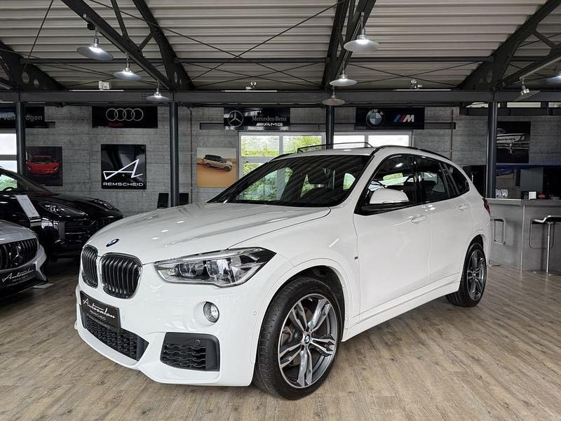 Alpinweiss iii Gebraucht 2018 BMW X1 M Sport SUV | 26.990 € (Fairer Preis) - Bild 1/4