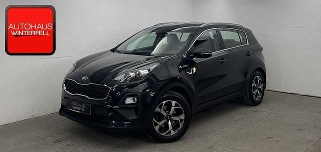 Zilina schwarz (metallic) Gebraucht 2021 Kia Sportage Vision SUV | 19.860 € (Teuer) - Bild 1/4