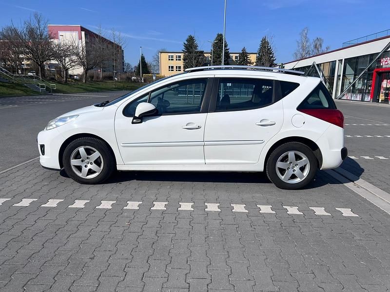 Gebraucht Peugeot 207 95 PS (69 kW) 2011 Weiß Kombi
