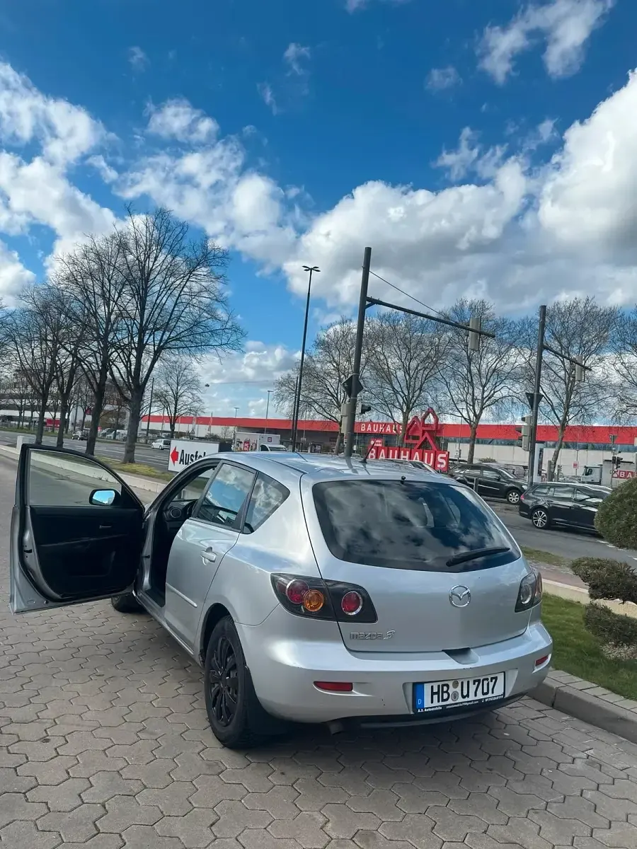 Używany Mazda 3 109 KM (80 kW) 2006 Szary Sedan/Limuzyna