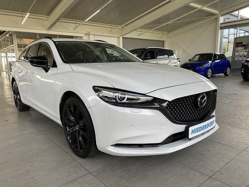 Gebraucht Mazda 6 Homura-Line 194 PS (142 kW) 2024 Rhodium white (metallic) Kombi