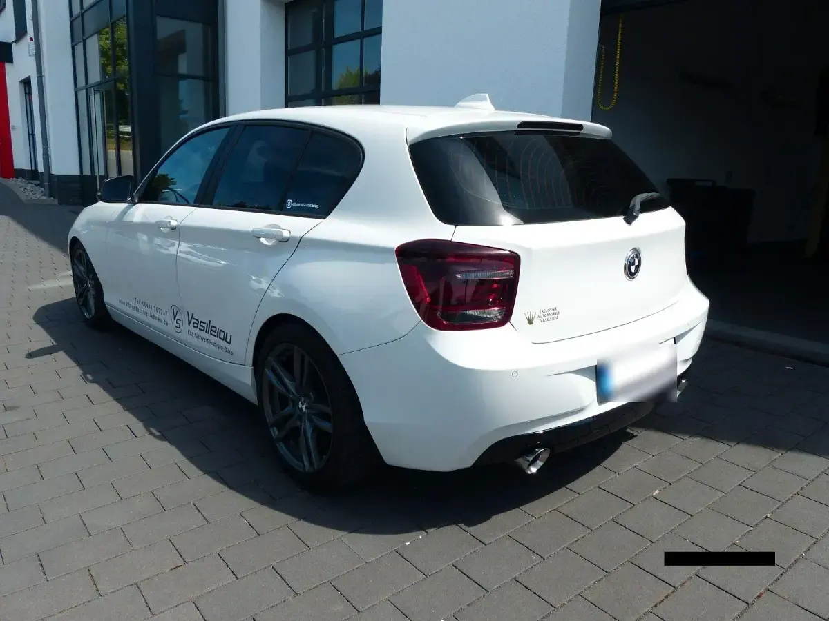 Używany BMW 118 Performance 143 KM (105 kW) 2011 Biały Hatchback