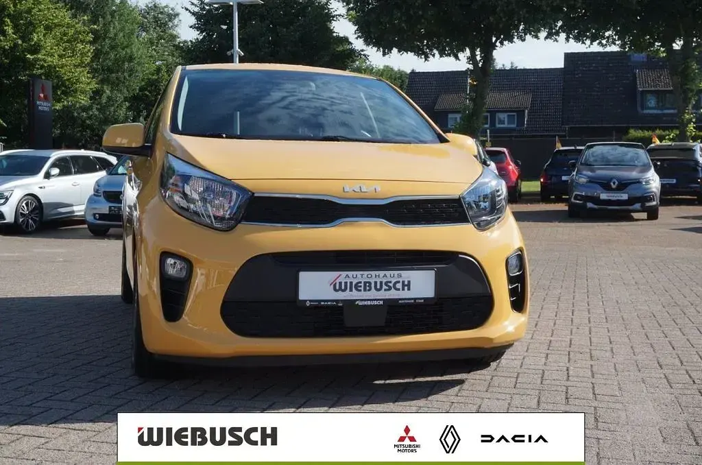 Gebraucht Kia Picanto Vision 67 PS (49 kW) 2023 (b2y) honey bee yellow met. (metallic) Kleinwagen