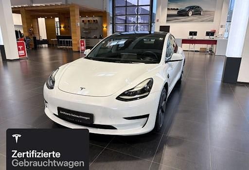 Weiß Gebraucht 2021 Tesla Model 3 Standard Range Limousine | 25.600 € (Fairer Preis) - Bild 1/4