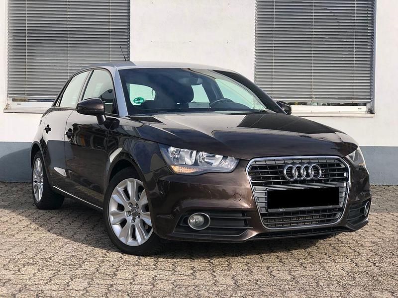 Braun Gebraucht 2012 Audi A1 Sportback Ambition Kleinwagen | 9.995 € (Fairer Preis) - Bild 1/4