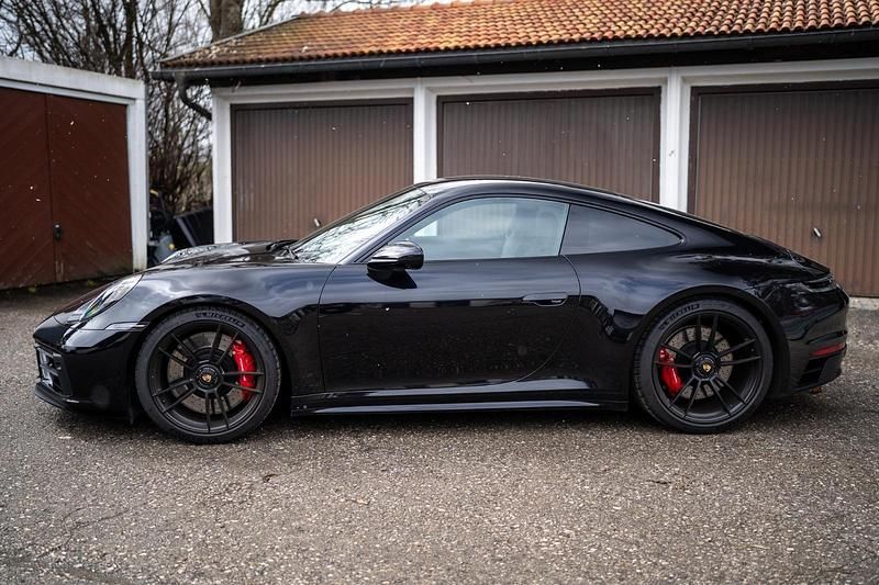 Gebraucht Porsche 992 480 PS (353 kW) 2023 Schwarz Coupé