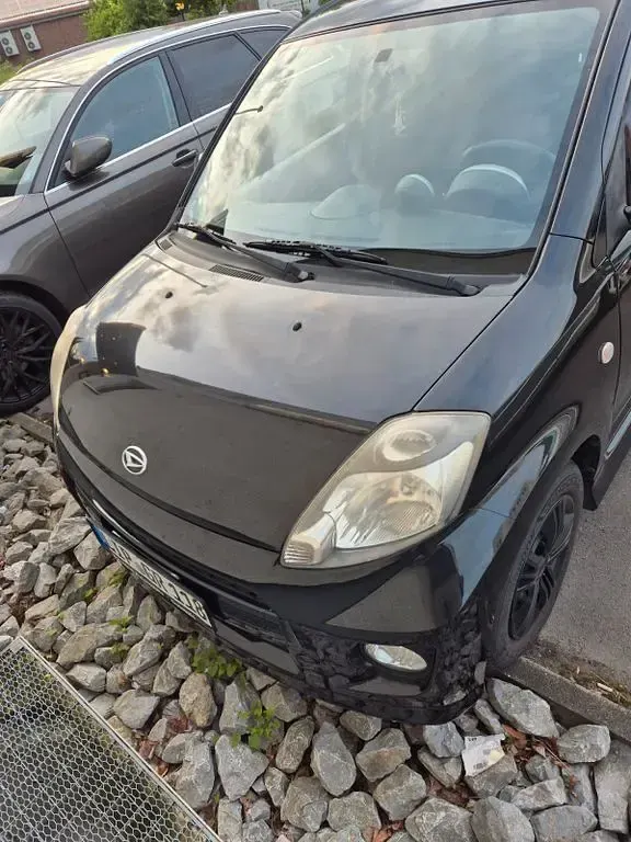 Gebraucht Daihatsu Sirion 87 PS (63 kW) 2005 Schwarz Kleinwagen