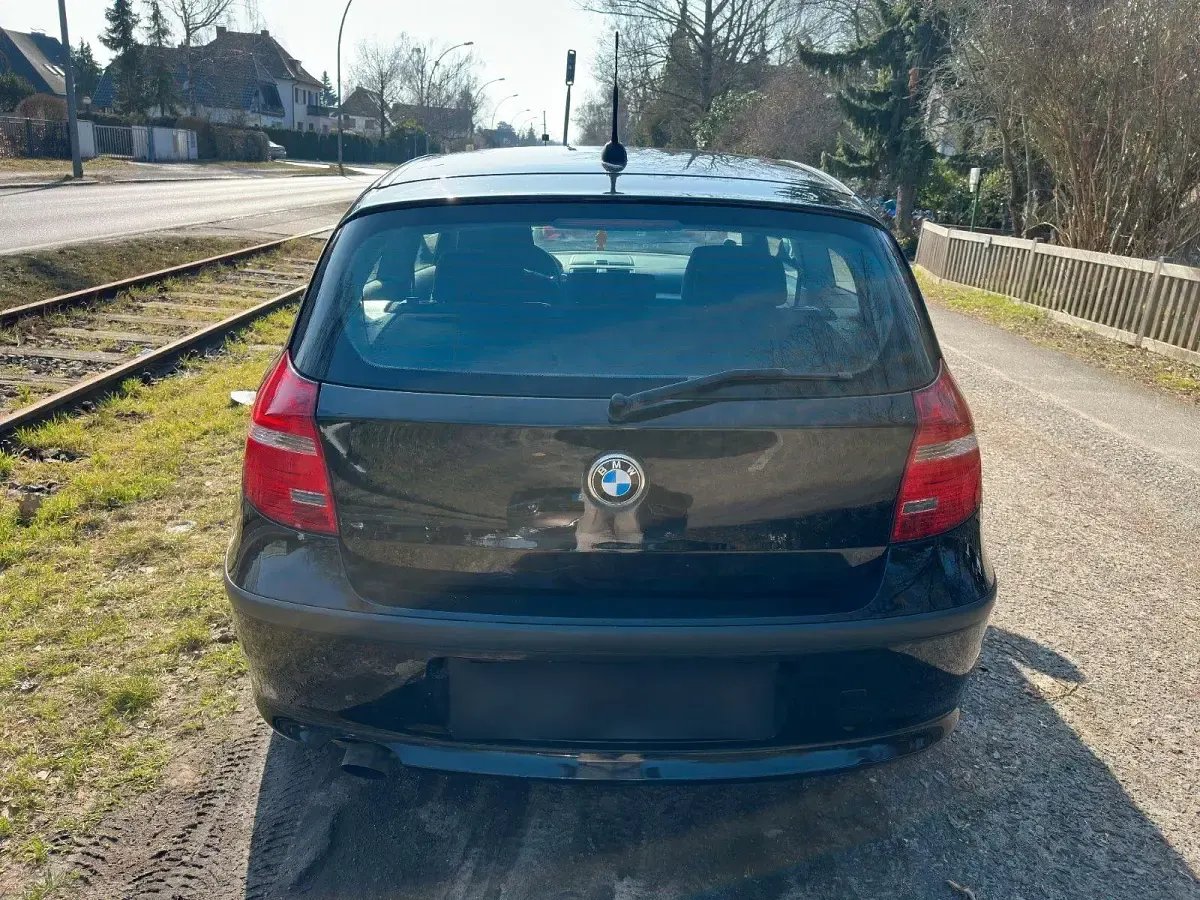 Używany BMW 116 122 KM (89 kW) 2010 Czarny Hatchback