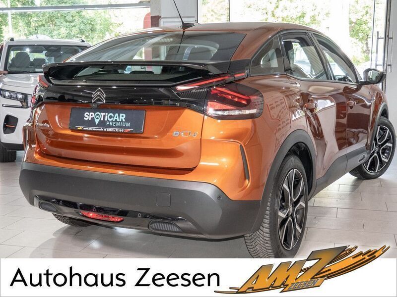 Gebraucht Citroën e-C4 Feel 100 kW (136 PS) 2022 Karamellbraun (metallic) Limousine
