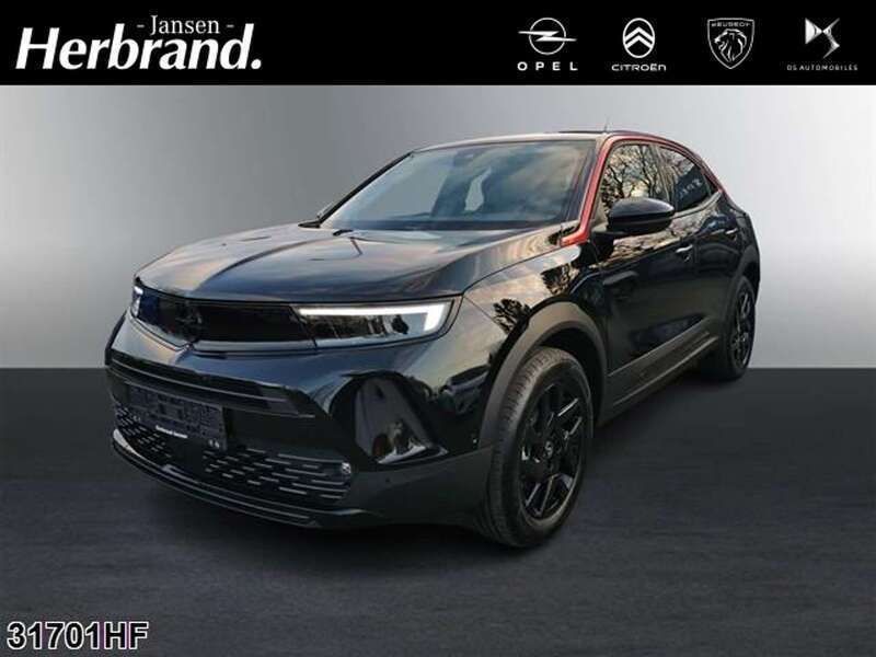 Lackierung schwarz perla nera/ Gebraucht 2025 Opel Mokka-e SUV | 30.289 € - Bild 1/4