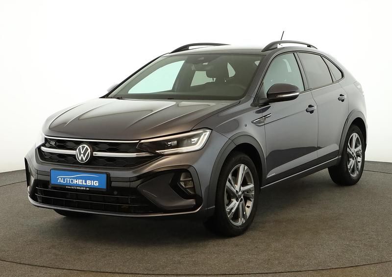 Rauchgrau metallic Gebraucht 2024 VW Taigo R-line SUV | 25.480 € (Fairer Preis) - Bild 1/4