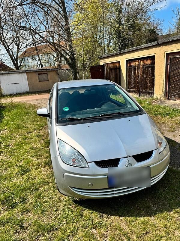 Second-hand Mitsubishi Colt 70 CP (51 kW) 2006 Argintiu Hatchback