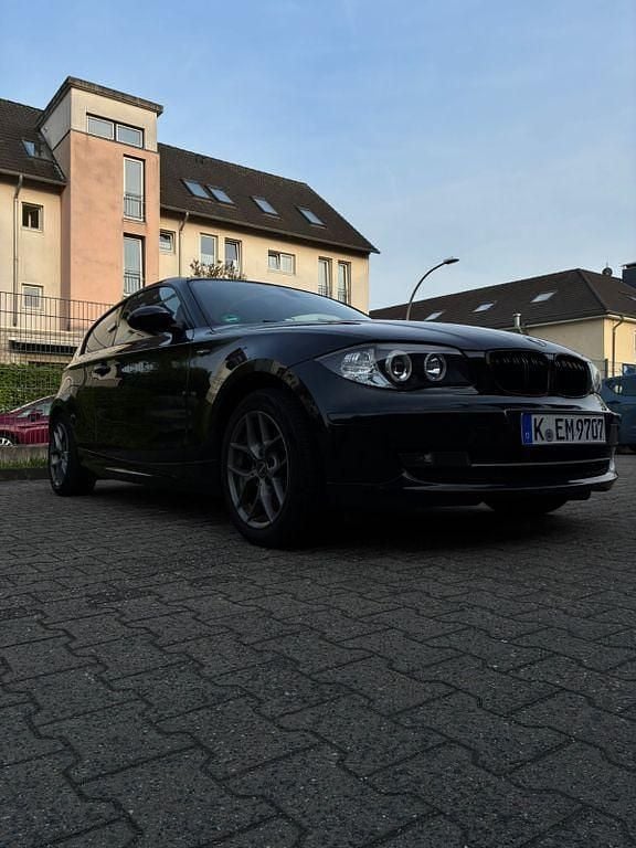 Second-hand BMW 116 122 CP (89 kW) 2008 Negru Hatchback