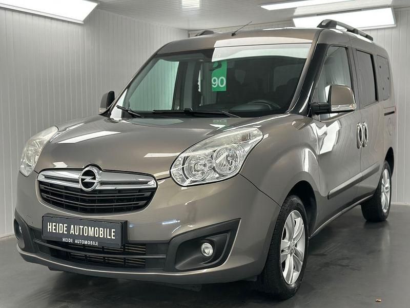 Grau Gebraucht 2012 Opel Combo Edition Van / Kleinbus | 9.950 € (Teuer) - Bild 1/4