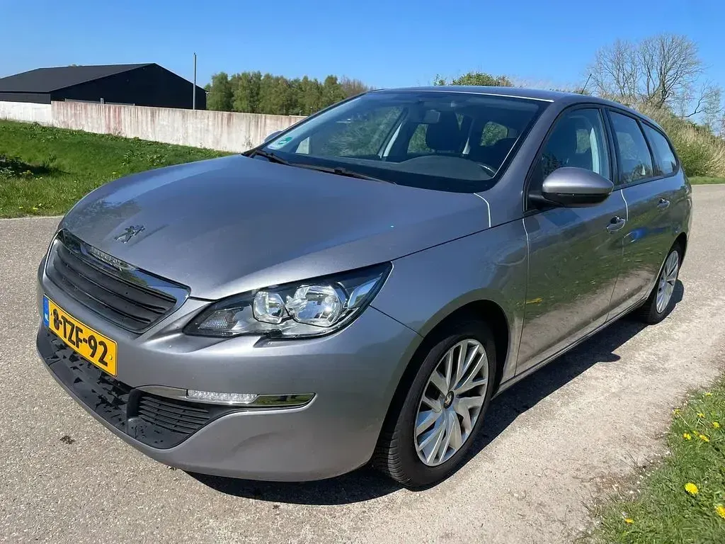 Gebraucht Peugeot 308 SW 120 PS (88 kW) 2014 Grau Kombi
