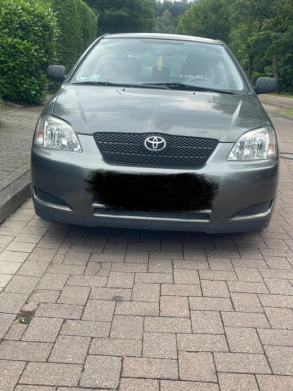 Grün Gebraucht 2002 Toyota Corolla Limousine | 2.200 € (Fairer Preis) - Bild 1/4