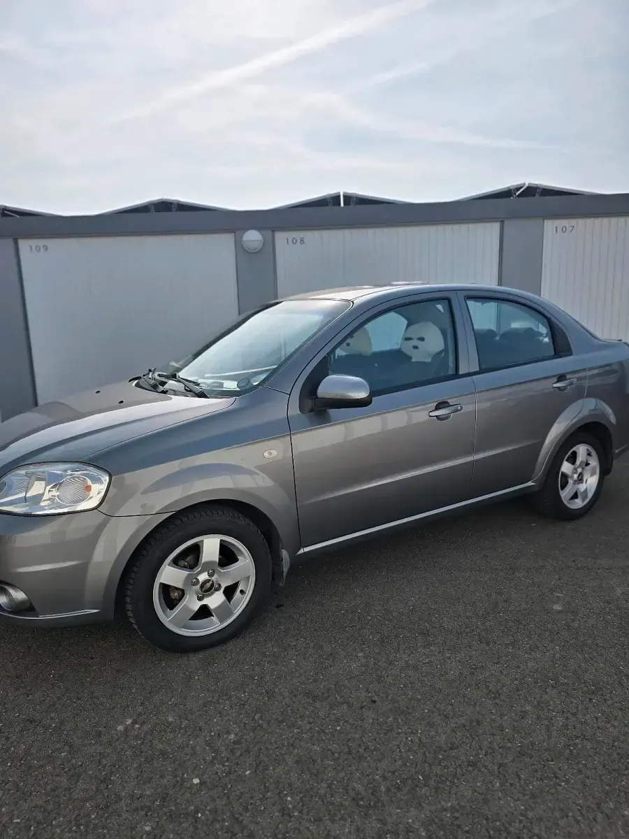 Second-hand Chevrolet Aveo 95 CP (69 kW) 2009 Argintiu Berlinǎ