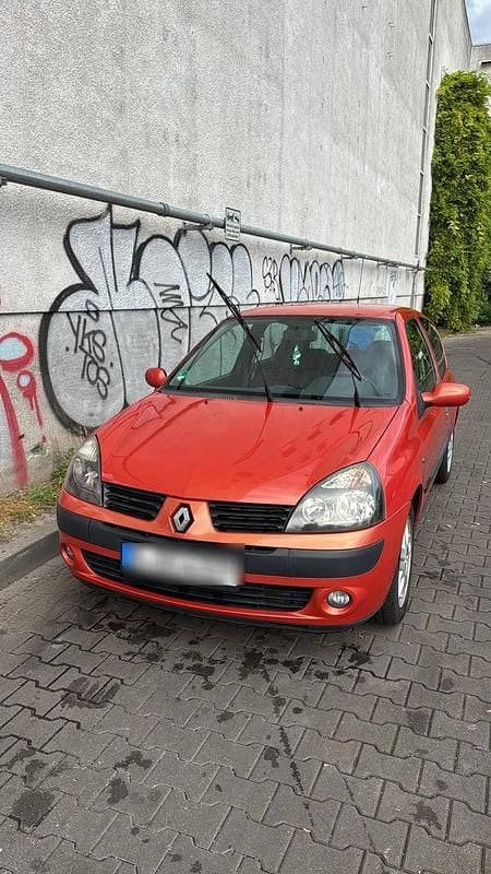 Orange Gebraucht 2004 Renault Clio Coupé | 1.750 € - Bild 1/3