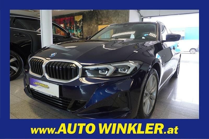 Blau Gebraucht 2022 BMW 320e Kombi | 25.980 € (Superpreis) - Bild 1/4