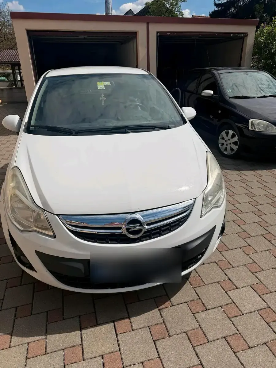 Second-hand Opel Corsa 84 CP (61 kW) 2012 Alb Hatchback