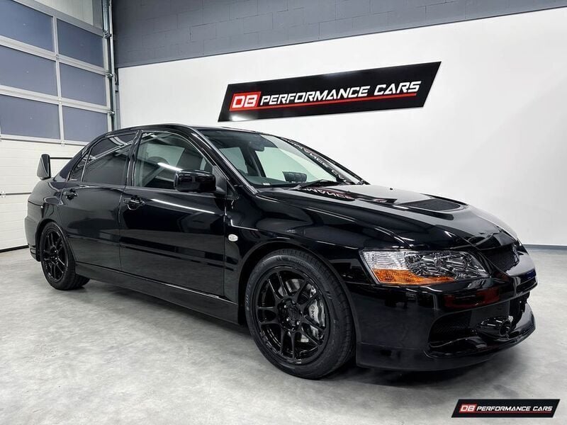 Panther schwarz Gebraucht 2006 Mitsubishi Lancer Top Limousine | 38.990 € - Bild 1/4