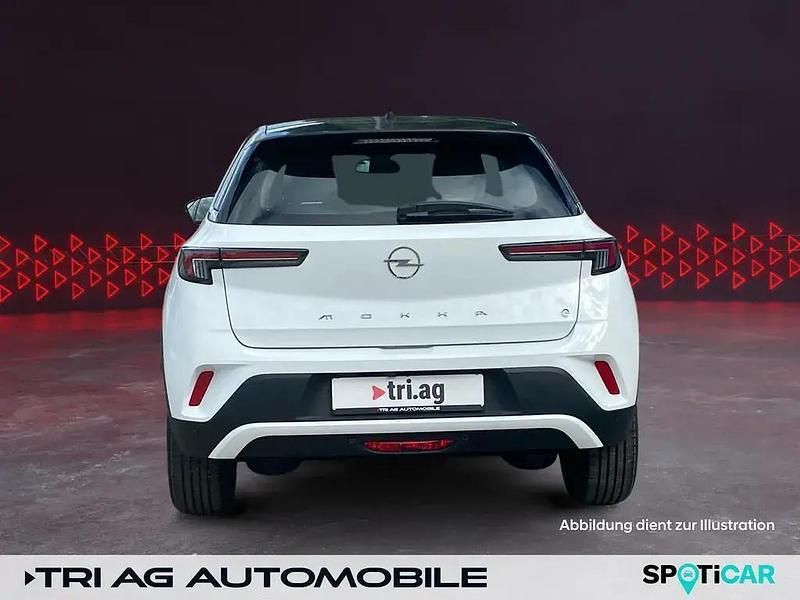 Gebraucht Opel Mokka-e Elegance 100 kW (136 PS) 2023 Arktis weiß / karbon schwarz SUV