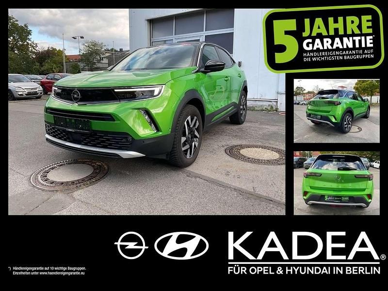 Matcha green/ikone gruen (metallic) Gebraucht 2022 Opel Mokka SUV | 19.790 € (Fairer Preis) - Bild 1/4