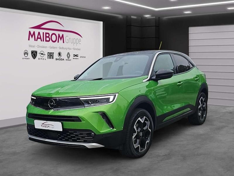 Matcha green/ikone gruen Gebraucht 2022 Opel Mokka Ultimate SUV | 20.445 € (Fairer Preis) - Bild 1/4