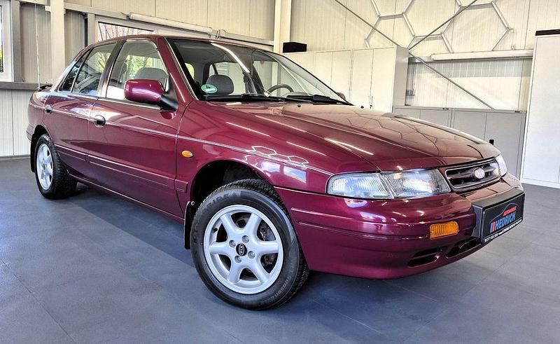 Violet Gebraucht 1995 Kia Sephia Limousine | 3.390 € - Bild 1/4