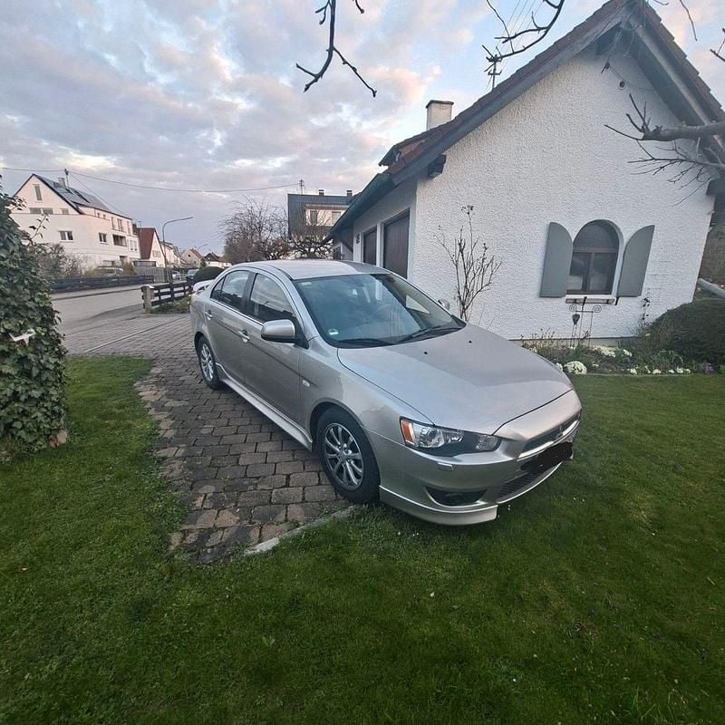 Gebraucht Mitsubishi Lancer 117 PS (86 kW) 2012 Silber Limousine