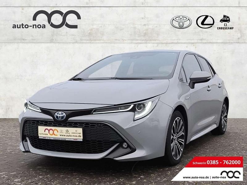 Manhattangrau metallic Gebraucht 2019 Toyota Corolla Hybrid Club Kleinwagen | 19.900 € (Guter Preis) - Bild 1/4