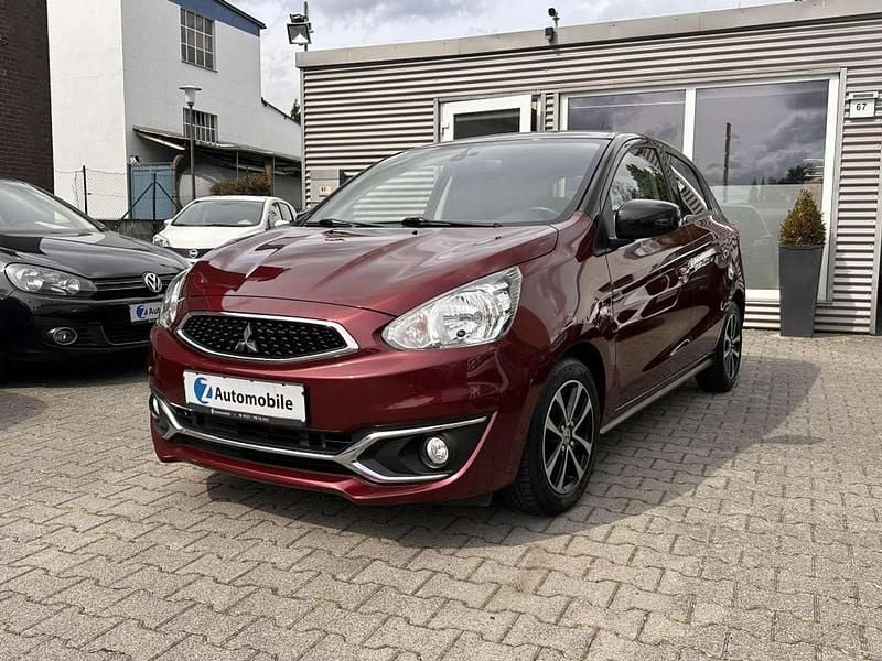 Bordeauxrot (p) Gebraucht 2016 Mitsubishi Space Star Diamant Edition Kleinwagen | 5.980 € (Guter Preis) - Bild 1/4
