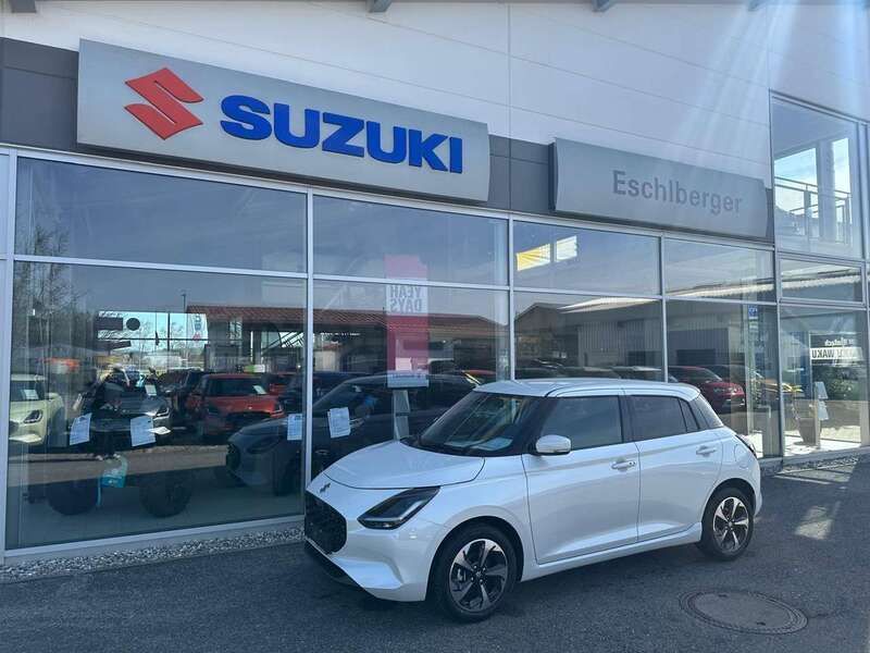 Pure white pearl metallic Neu 2025 Suzuki Swift Comfort+ Kleinwagen | 19.490 € - Bild 1/4