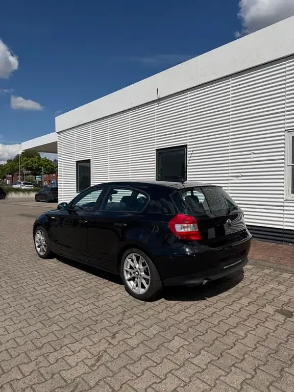 Gebraucht BMW 116 116 PS (85 kW) 2006 Schwarz Kleinwagen
