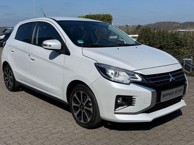 Weiß Gebraucht 2021 Mitsubishi Space Star Top Kleinwagen | 12.490 € (Fairer Preis) - Bild 1/4