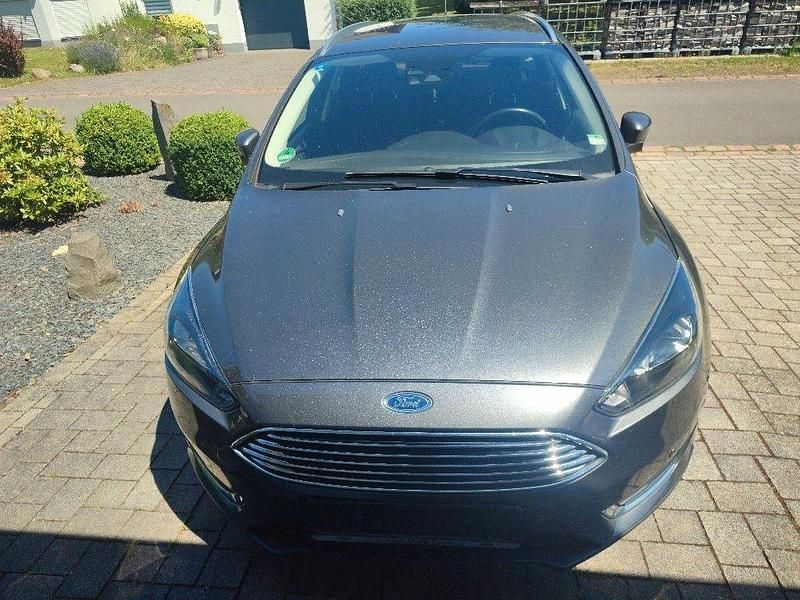 Gebraucht Ford Focus Titanium 125 PS (91 kW) 2014 Schwarz Kombi