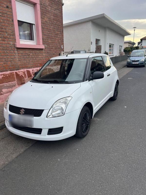 Weiß Gebraucht 2009 Suzuki Swift Limousine | 1.600 € (Superpreis) - Bild 1/4