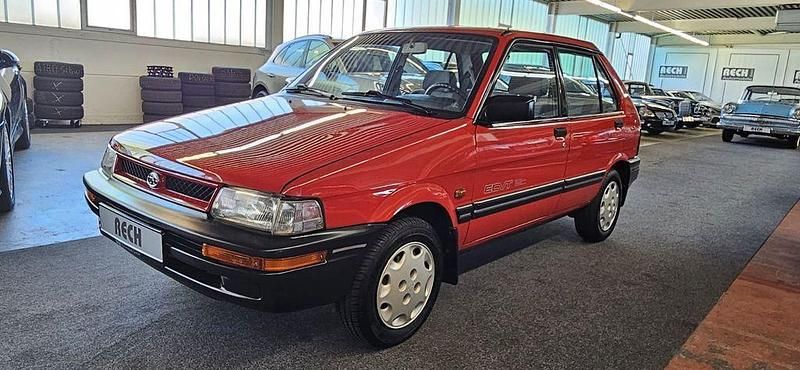 Gebraucht Subaru Justy 68 PS (50 kW) 1992 Rot Kleinwagen