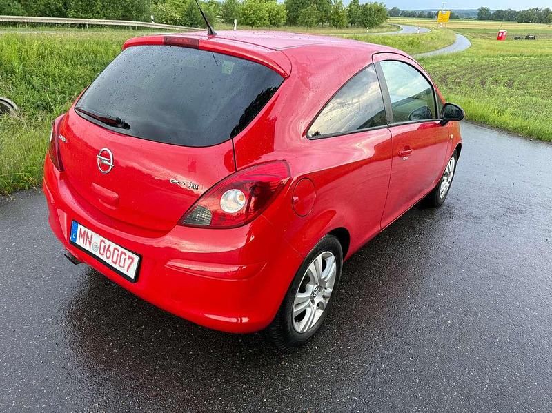 Gebraucht Opel Corsa Satellite 69 PS (50 kW) 2011 Magma rot (b) Kleinwagen