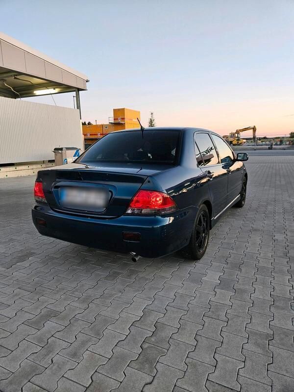 Blau Gebraucht 2004 Mitsubishi Lancer Limousine | 2.299 € (Fairer Preis) - Bild 1/4