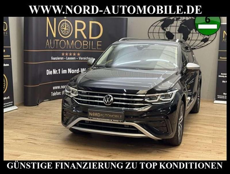 Deep black perleffek (metallic) Gebraucht 2022 VW Tiguan Allspace Elegance SUV | 29.800 € (Fairer Preis) - Bild 1/3