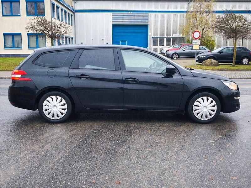 Gebraucht Peugeot 308 SW Access 116 PS (85 kW) 2014 Schwarz Kombi