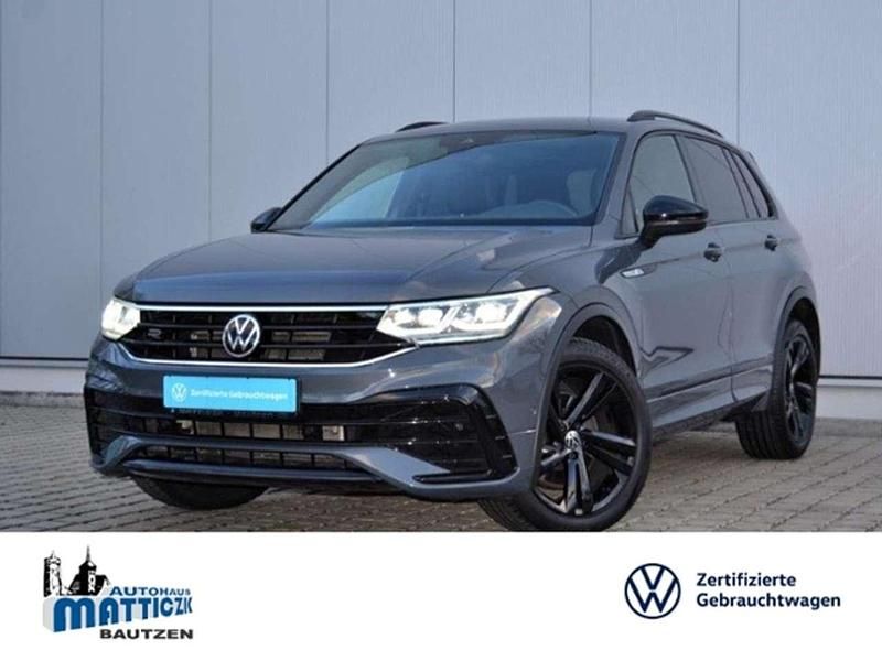 Delfingrau metallic (metallic) Gebraucht 2021 VW Tiguan R-line SUV | 34.879 € (Fairer Preis) - Bild 1/3