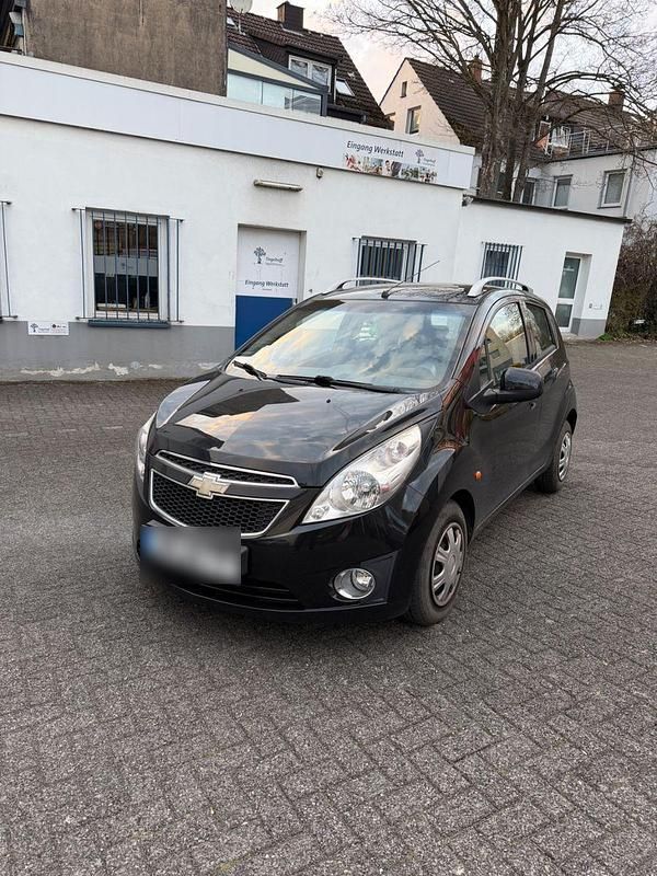 Second-hand Chevrolet Spark LS 82 CP (60 kW) 2011 Negru Hatchback
