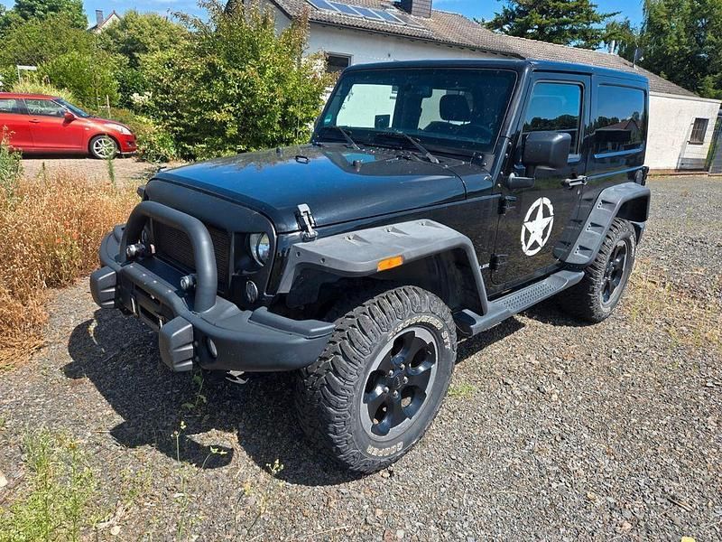 Schwarz Gebraucht 2015 Jeep Wrangler Unlimited Sahara SUV | 35.999 € (Fairer Preis) - Bild 1/4